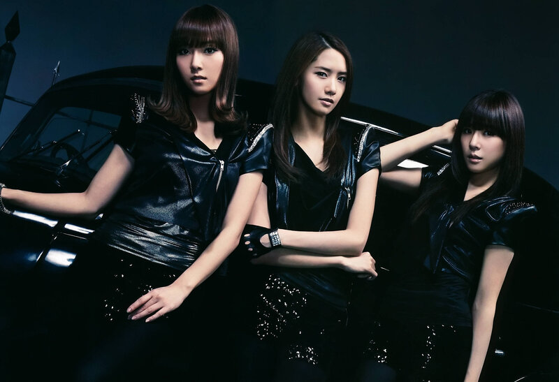 three women in black leather
