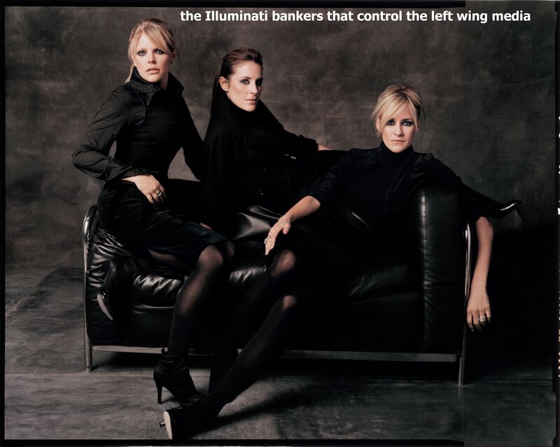 three women in black on a couch