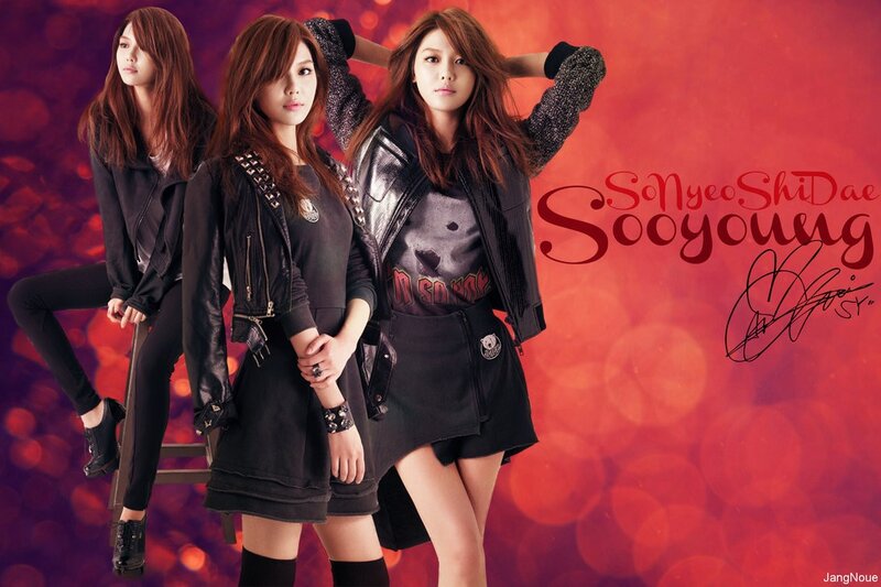 three women in black outfits
