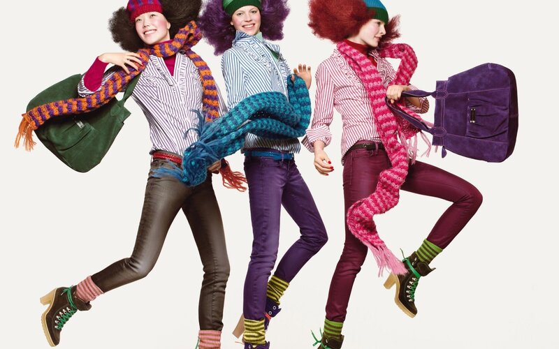 Three Women in Colorful Clothes