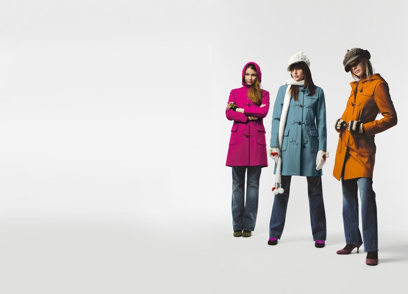 three women in colorful coats