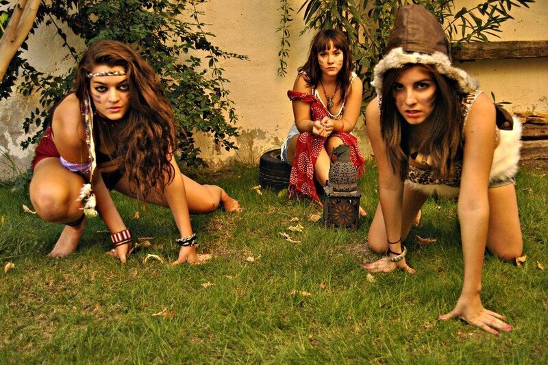 Three Women in Costumes — Green, Dramatic