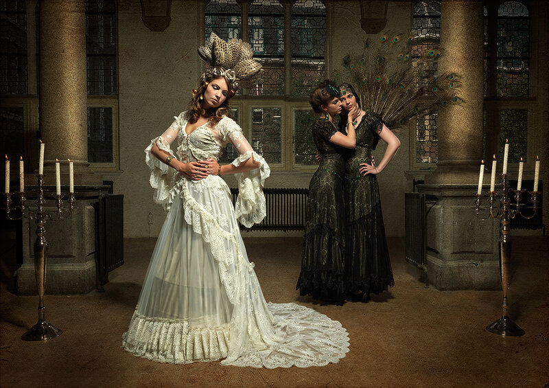 Three Women in Elaborate Dresses — White