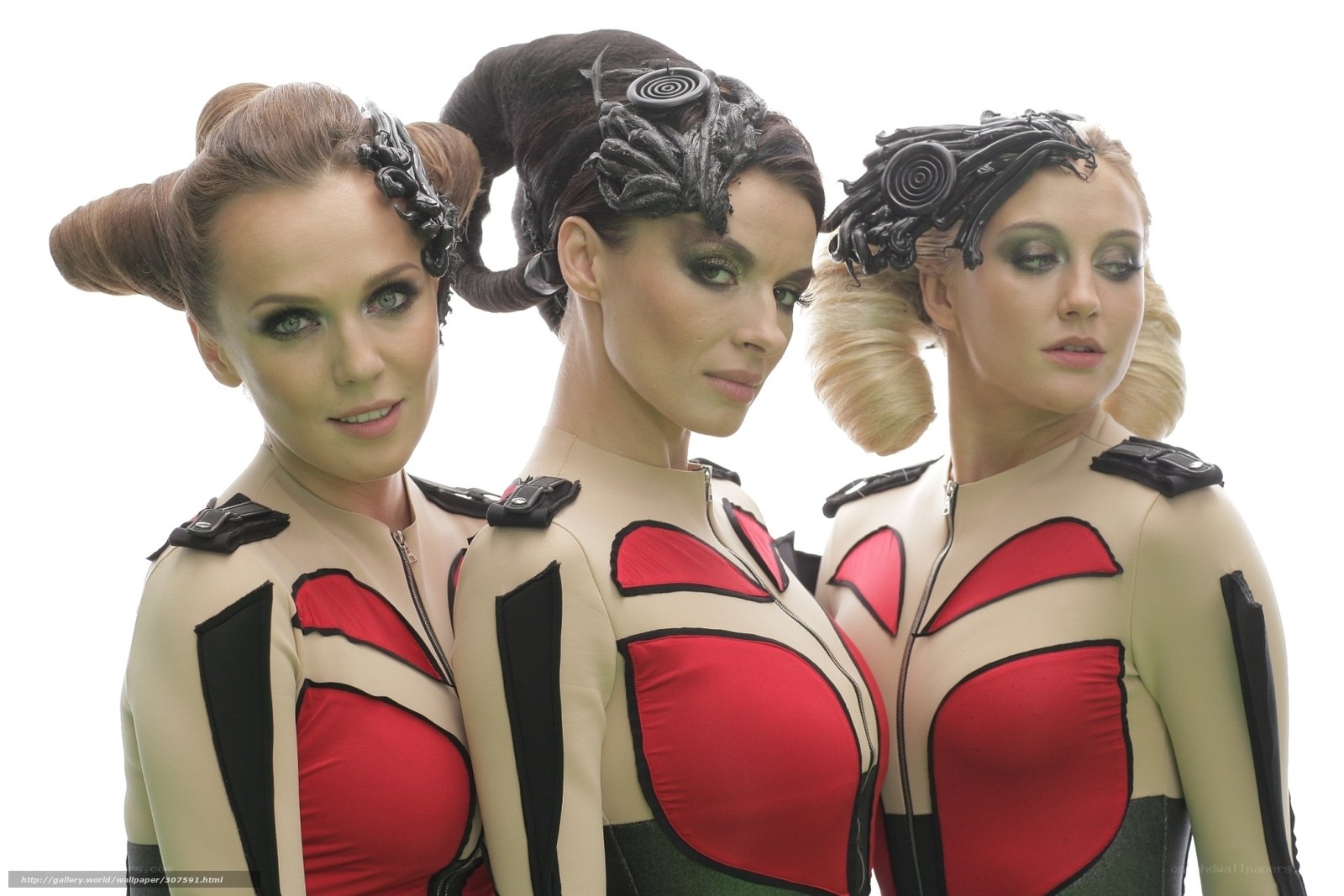 three women in futuristic costumes