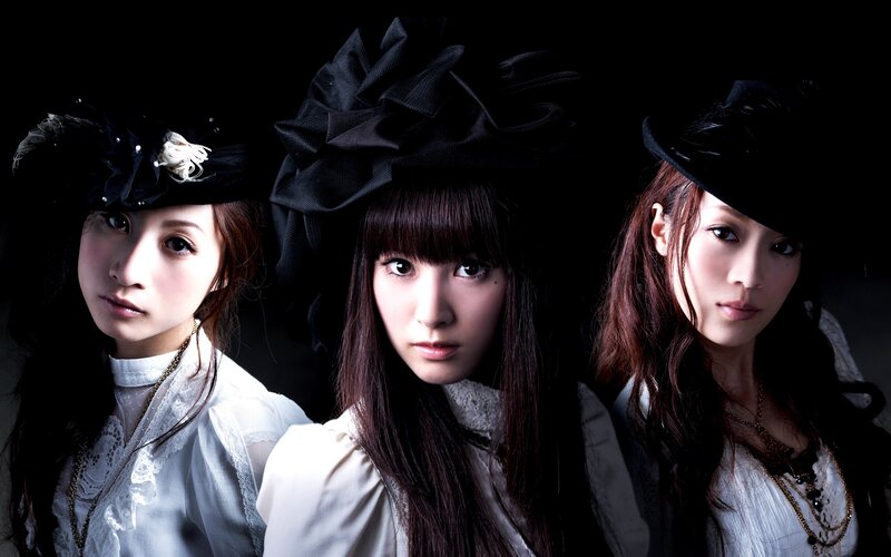 three women in gothic attire