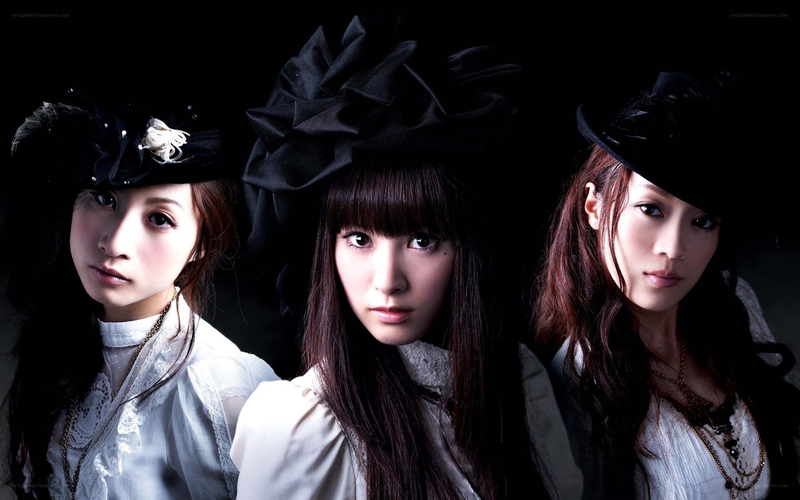 three women in gothic attire
