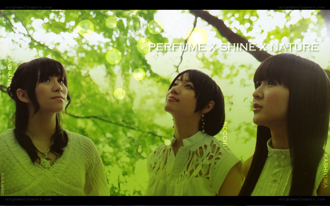 three women in green forest