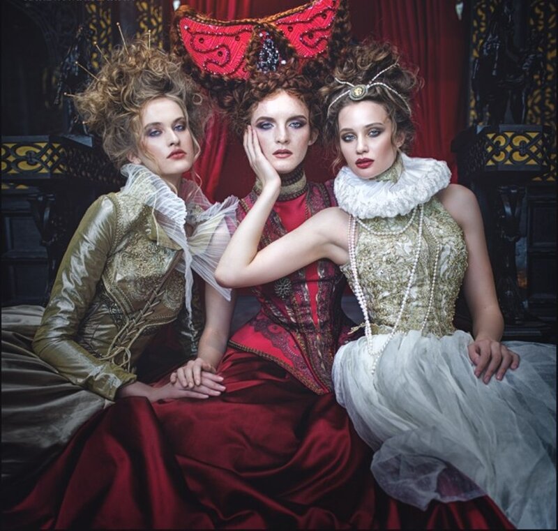 Three Women in Historical Costumes