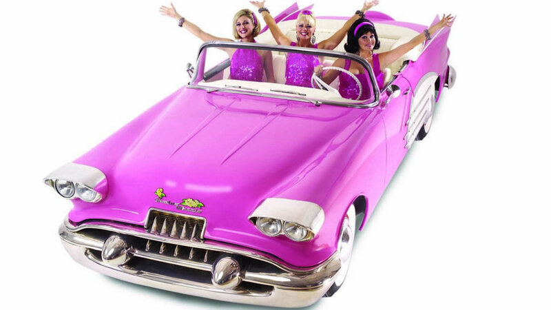 Three Women in Pink Car