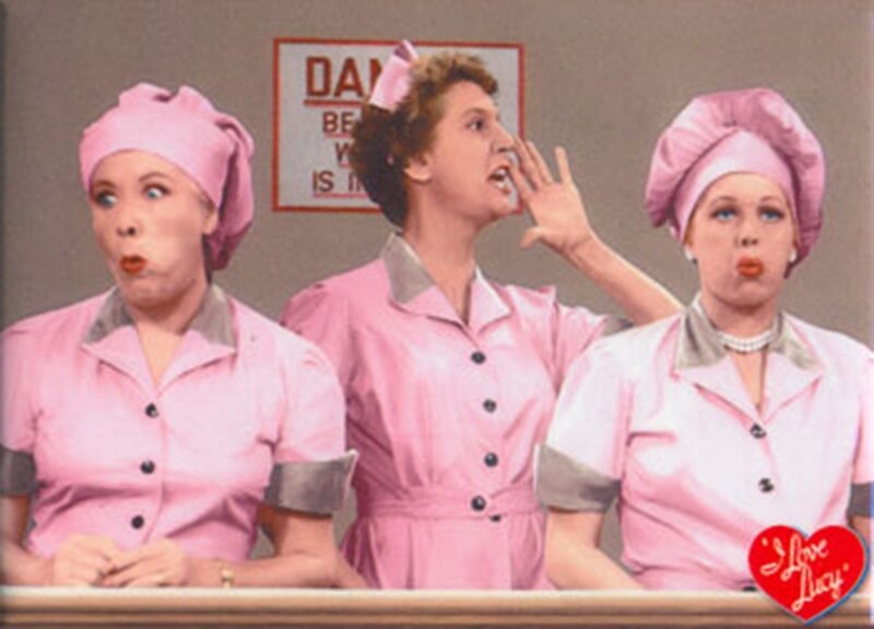 Three Women in Pink Uniforms