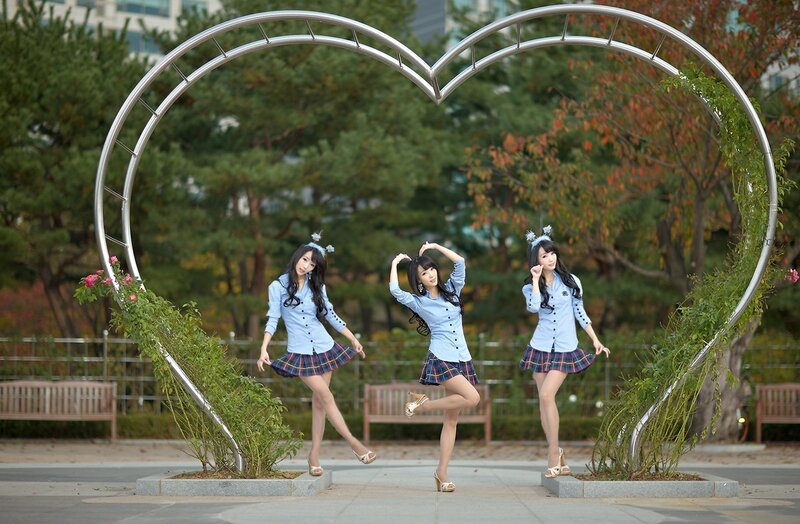 Three women in school uniforms