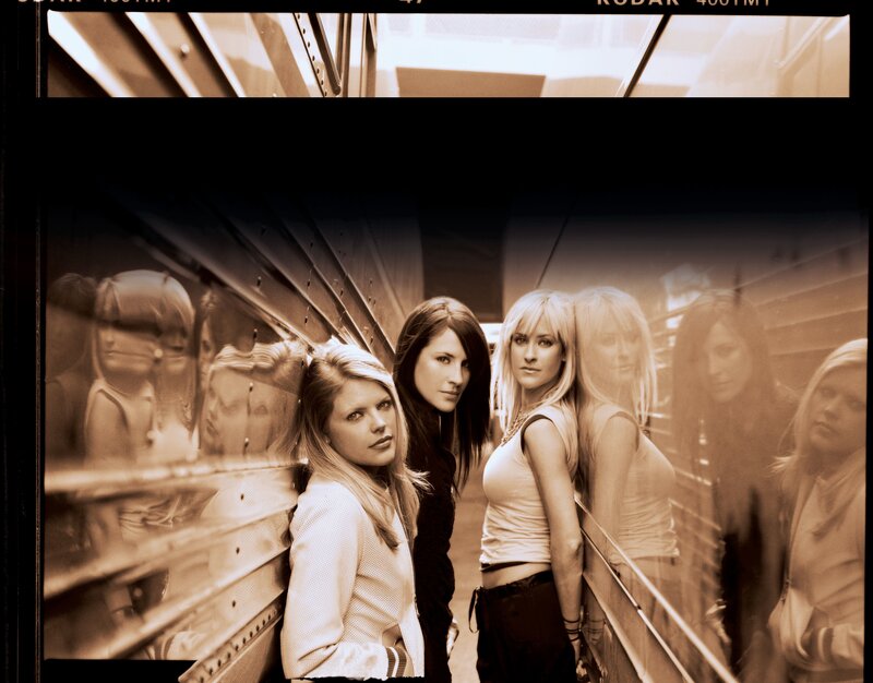 three women in sepia tone