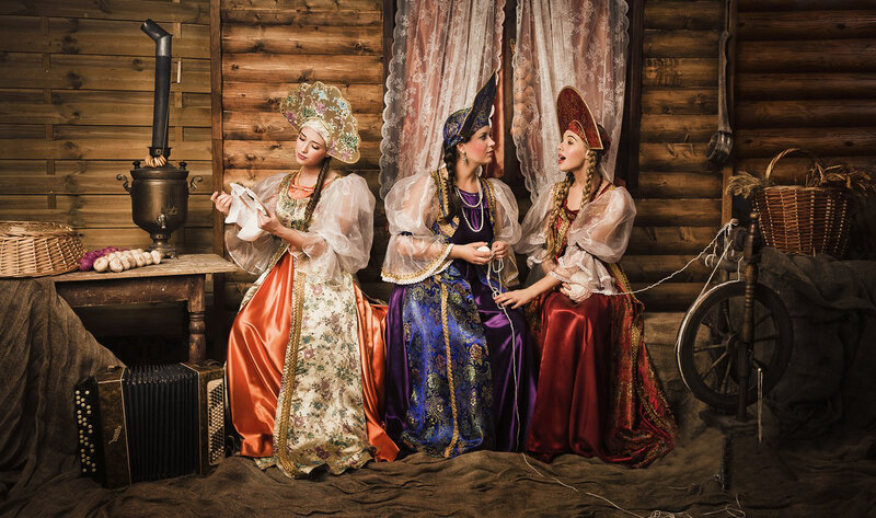 Three Women in Traditional Dress — Brown, Dramatic