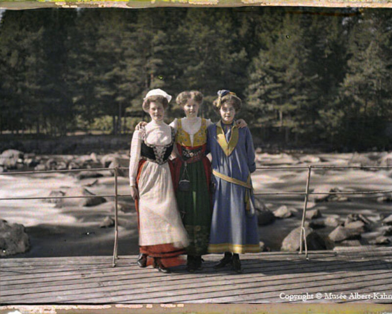 Three Women in Traditional Dresses