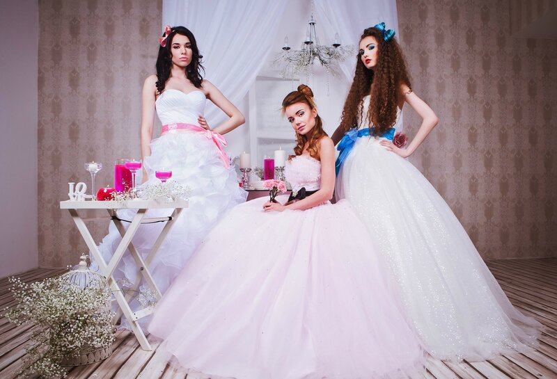 Three Women in Wedding Dresses — White, Dramatic