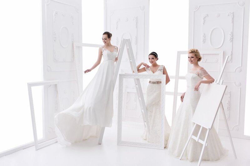 Three Women in Wedding Dresses — White, Serene
