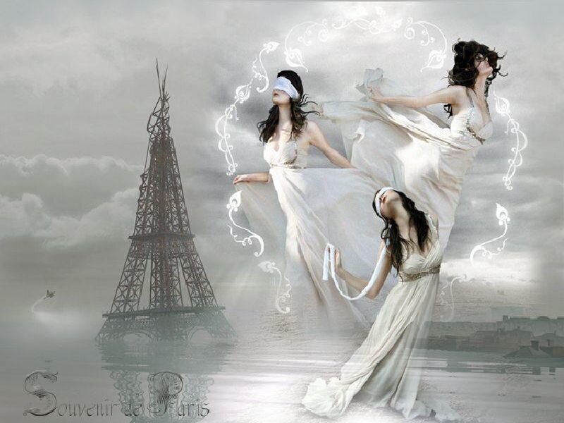 Three women in white gowns near Eiffel Tower