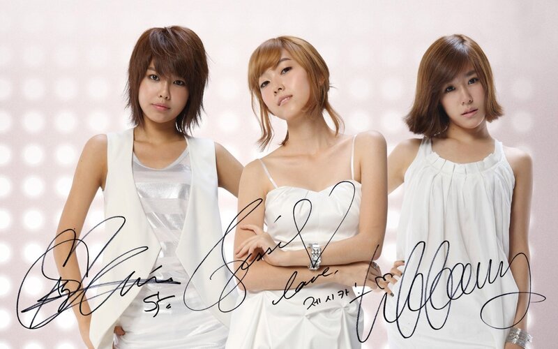 three women in white outfits