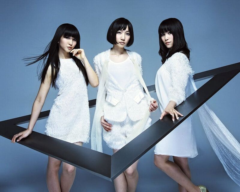 three women in white outfits