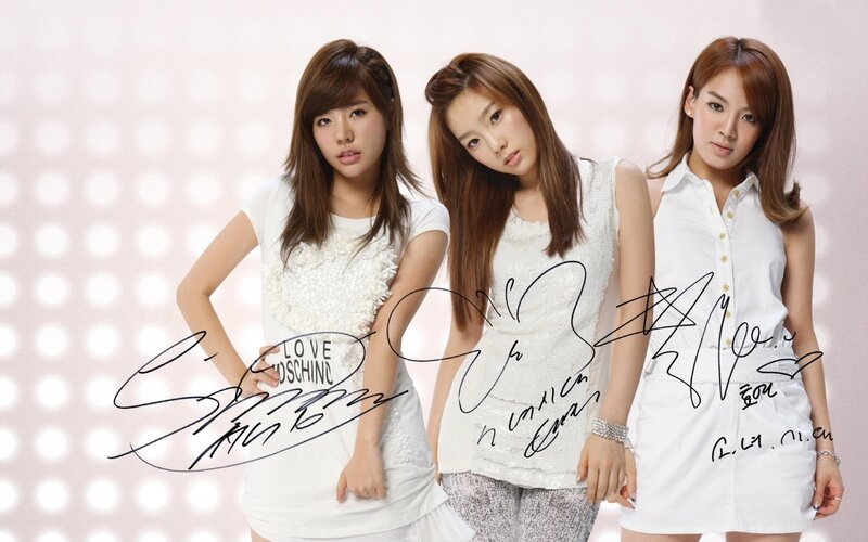 three women in white outfits