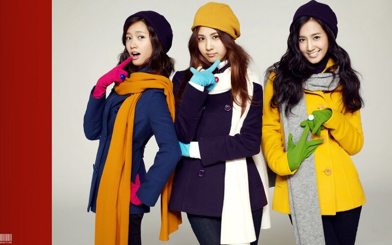 Three women in winter coats