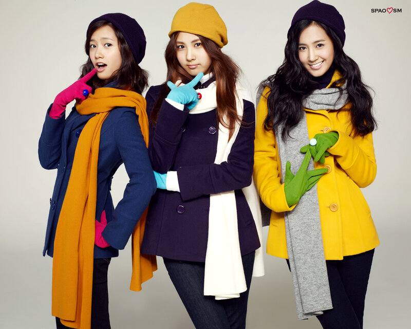 Three women in winter coats