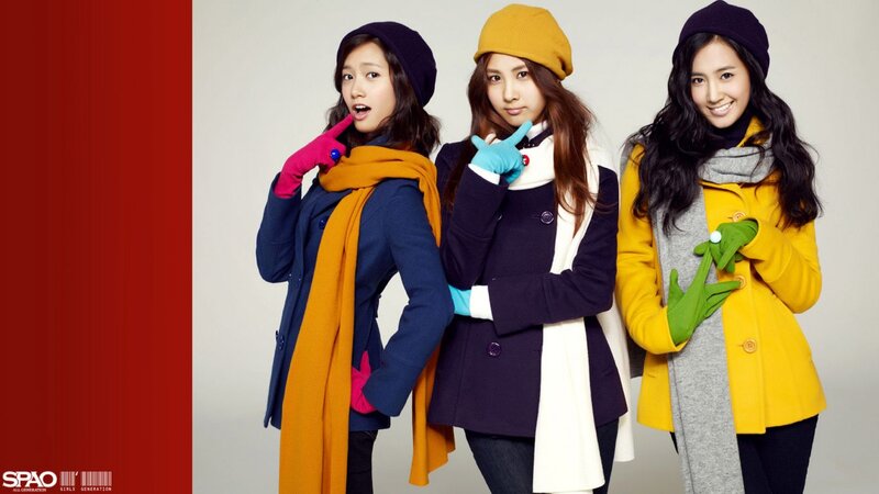Three Women in Winter Coats — Yellow