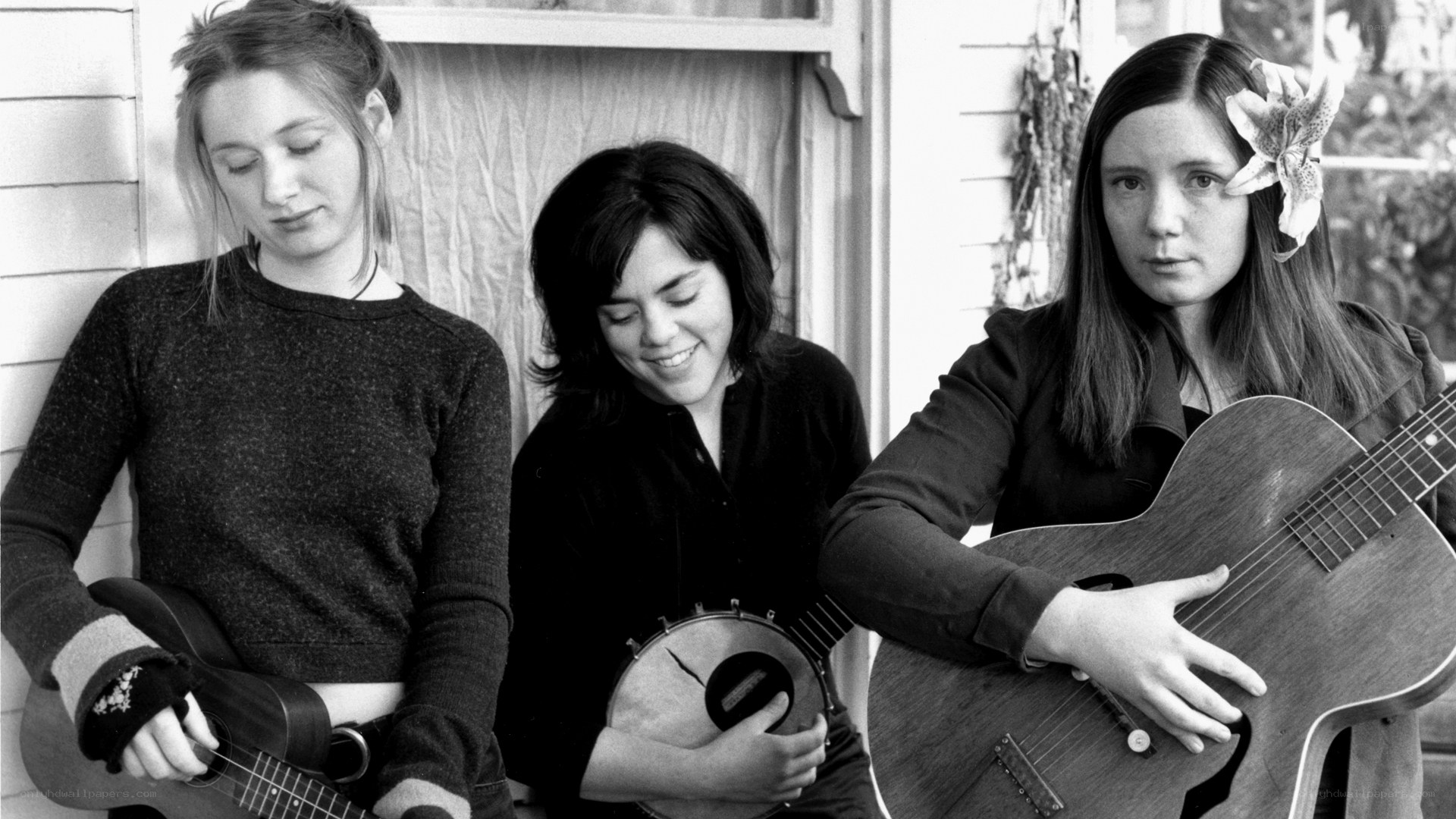 three women musicians with instruments