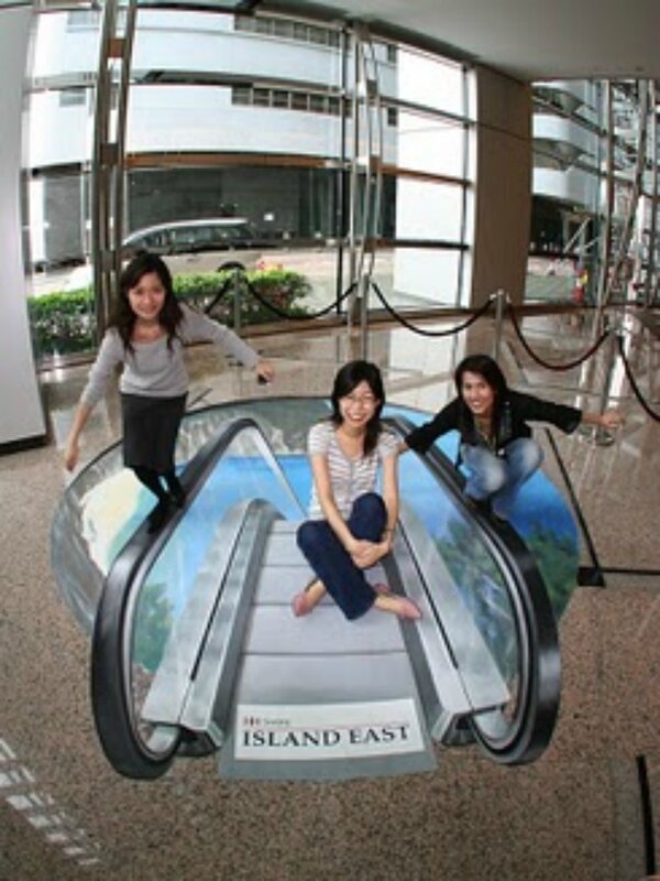 Three women on a fake escalator