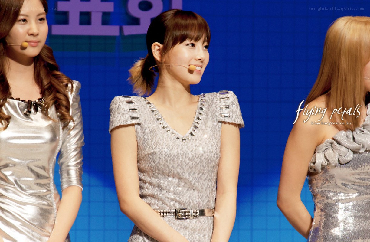 three women on stage