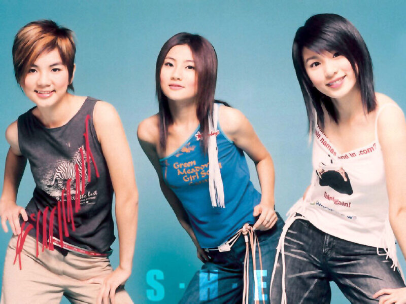 three women posing in casual wear