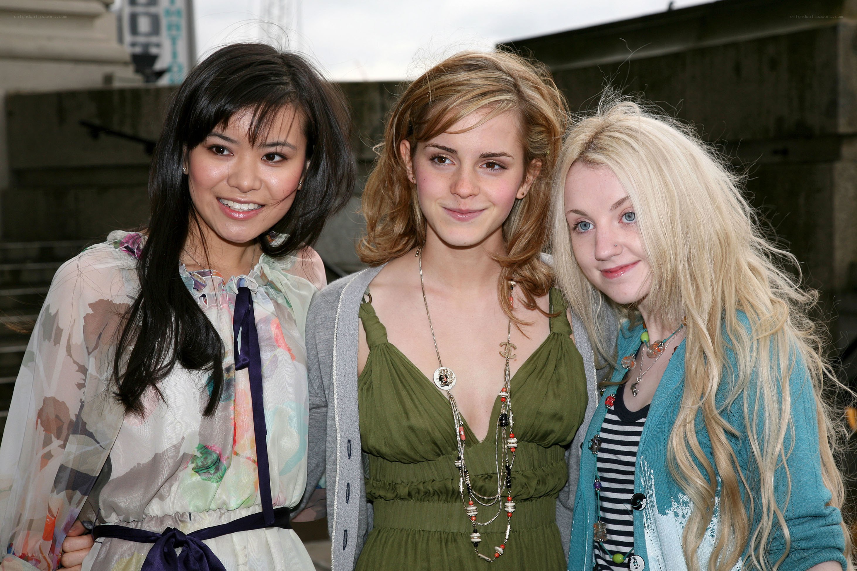 three women posing together