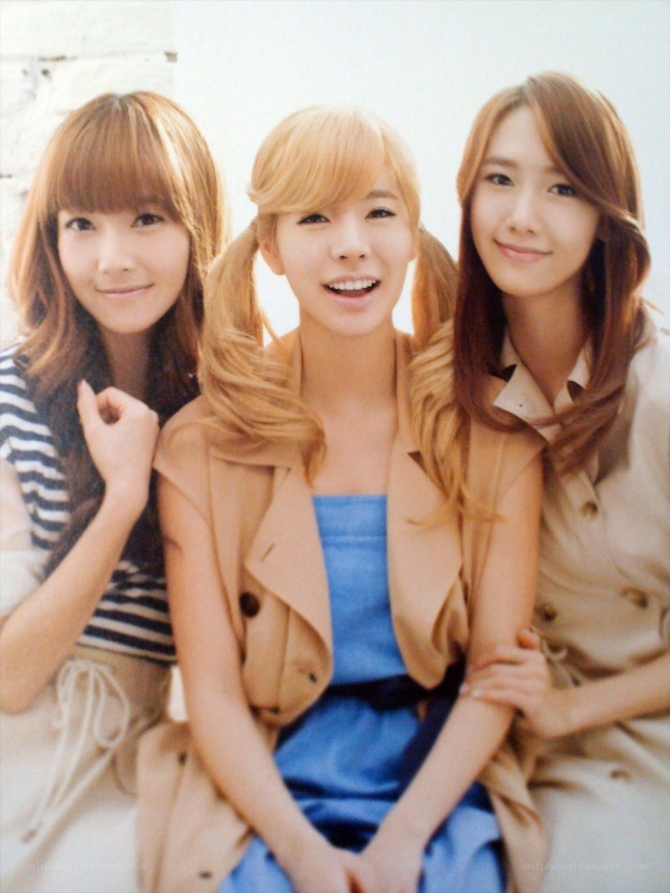 three women posing together