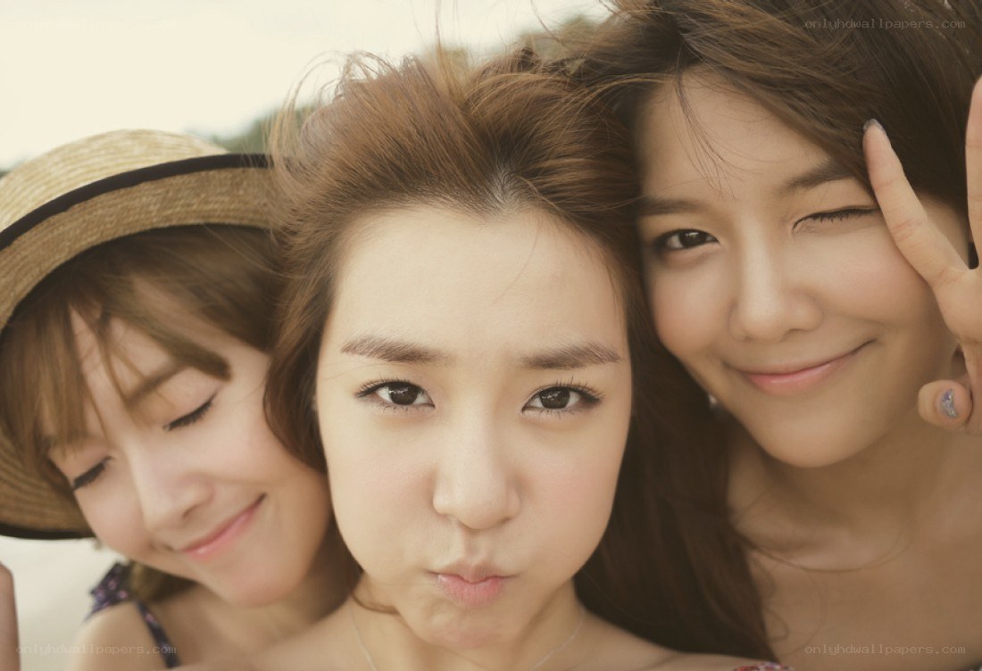 Three women posing together