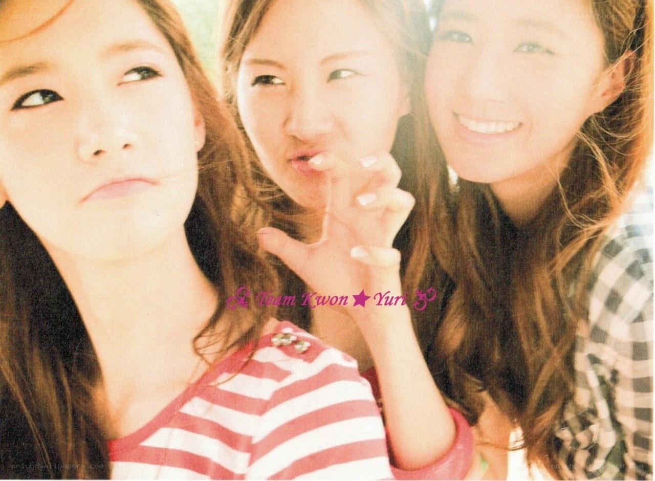 three women posing together