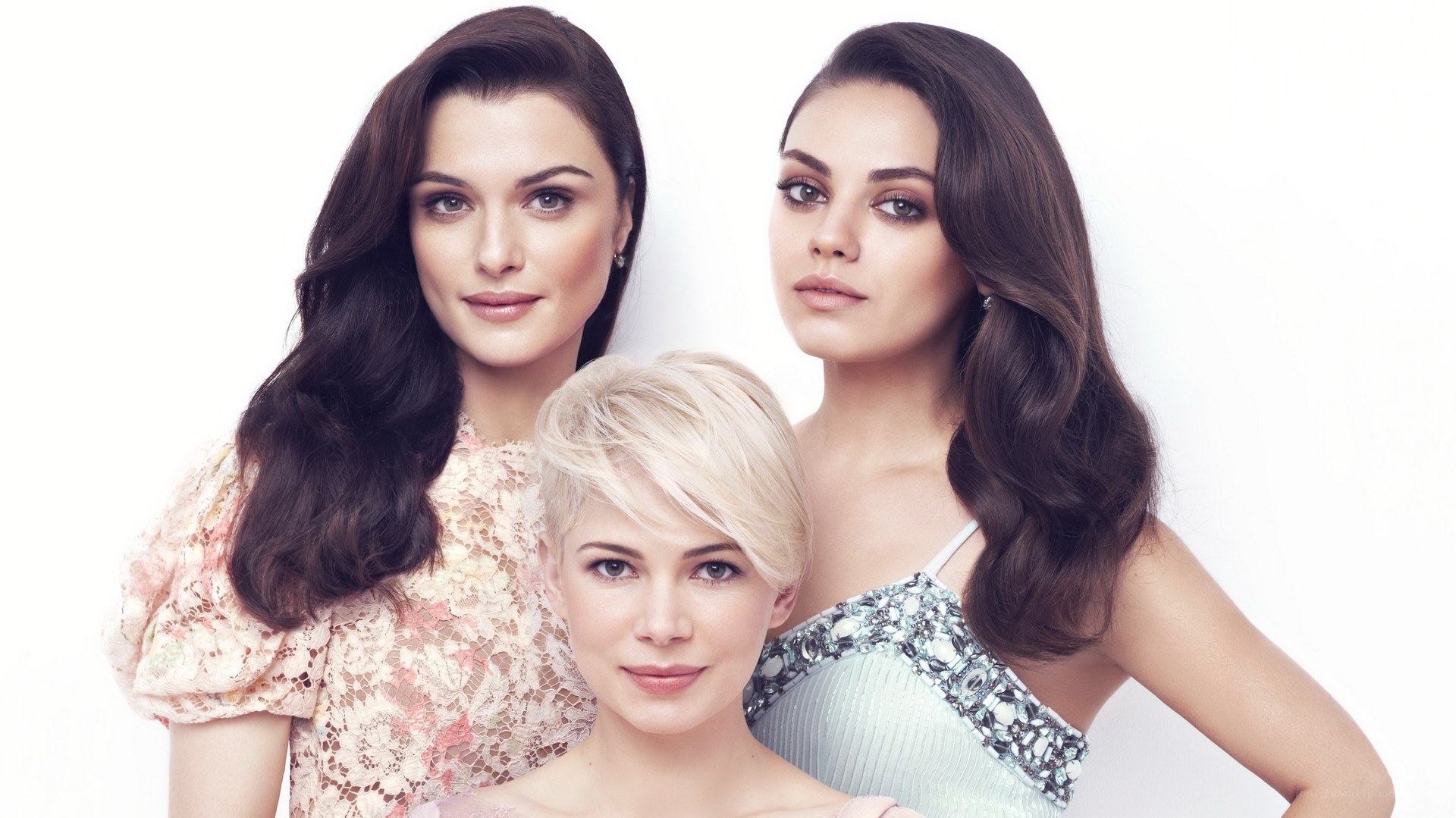 three women posing together