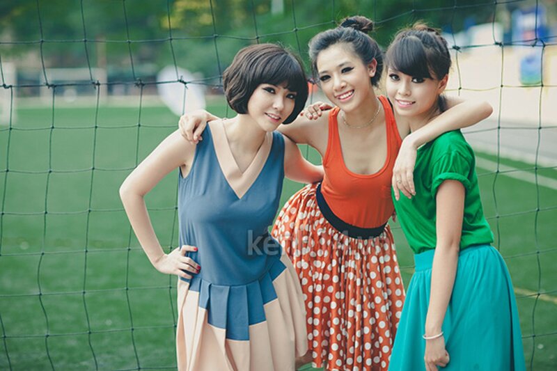 Three Women Posing Together — Green, Friendly
