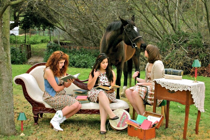 Three Women Reading Outdoors