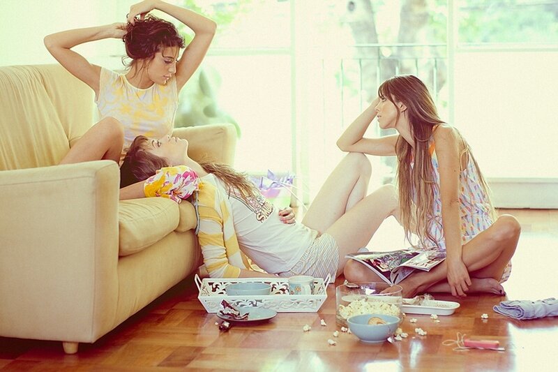 Three women relaxing at home