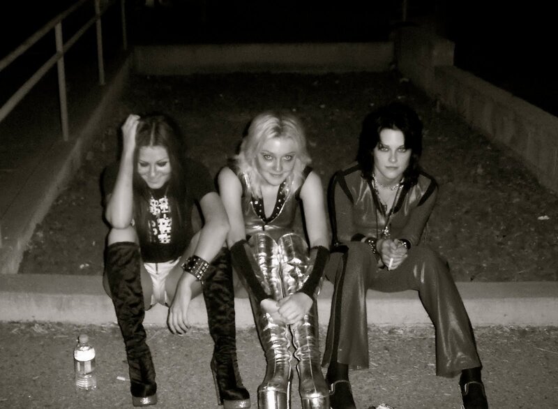 Three Women Sitting on Steps