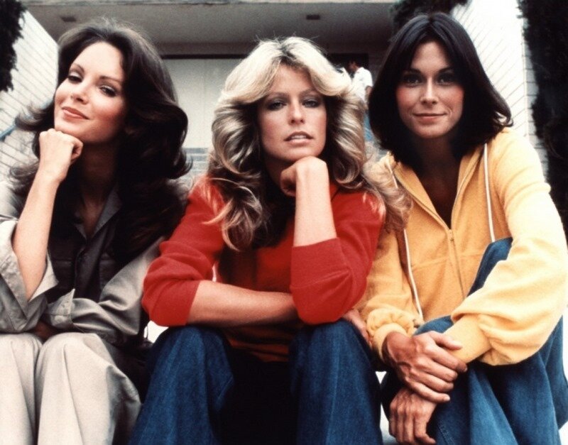 Three Women Sitting Together — Red