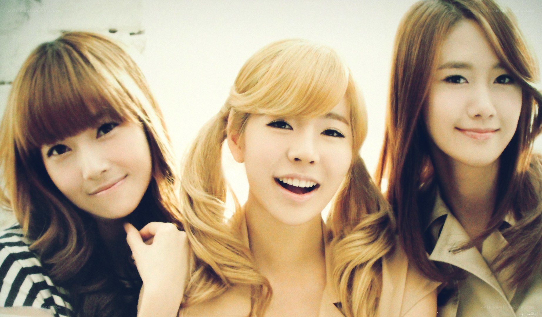 three women smiling together