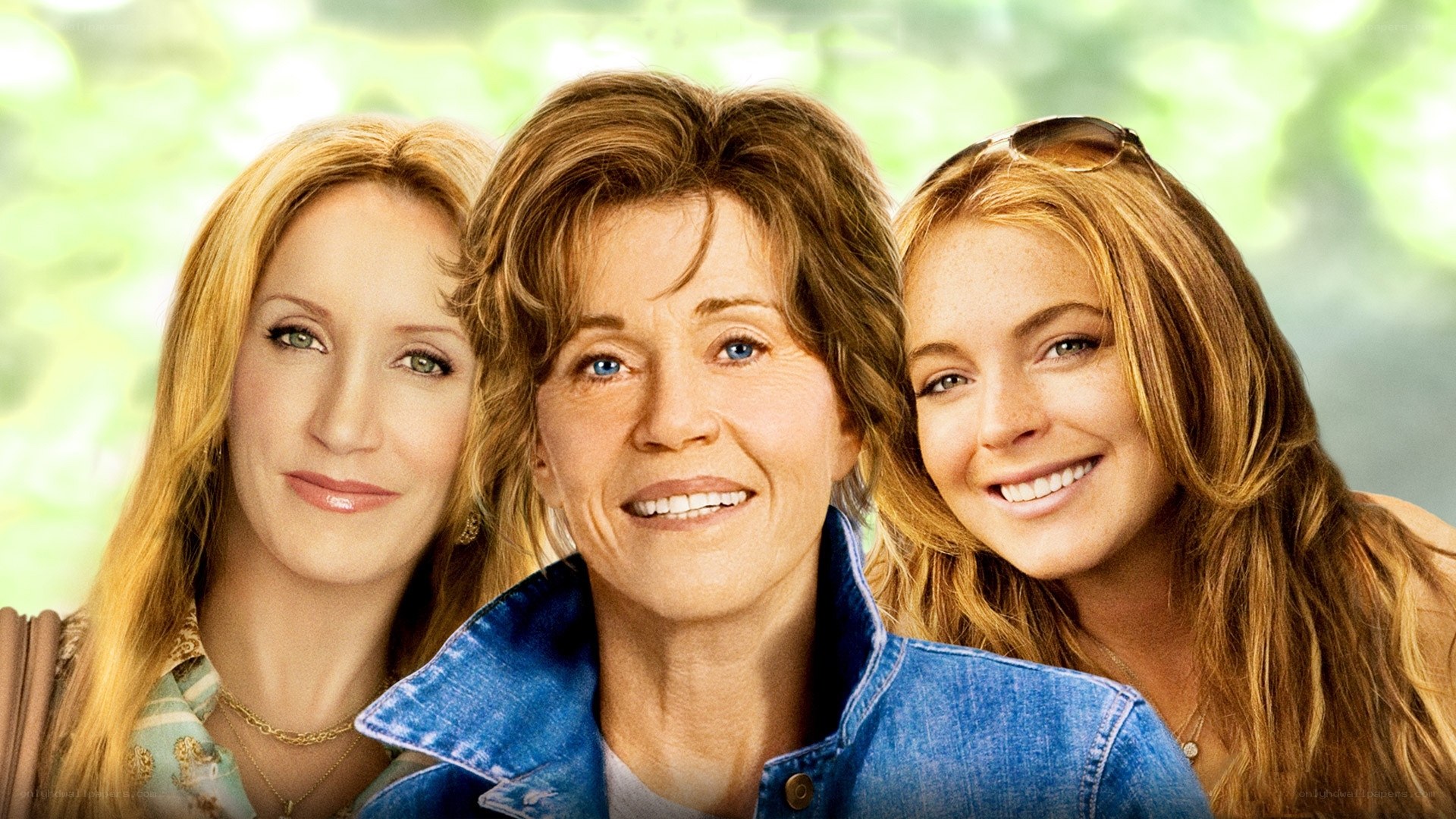 three women smiling together