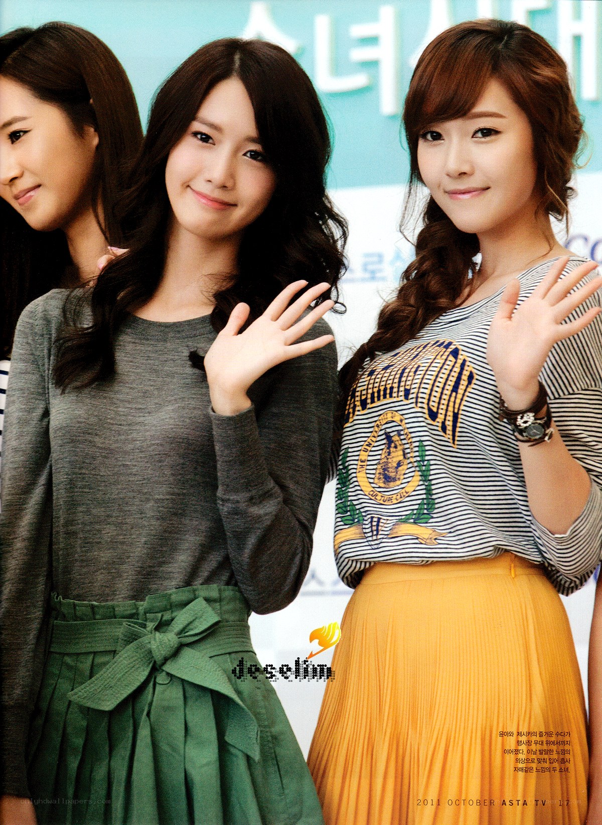 three women waving at event