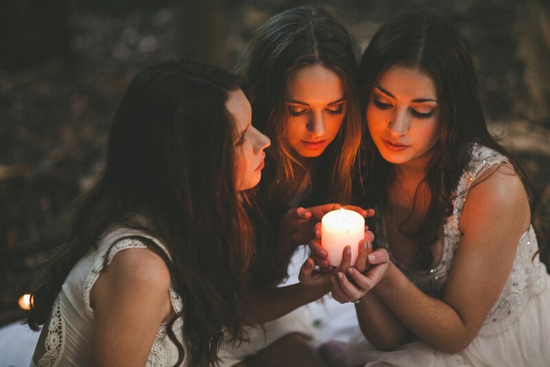 Three Women with Candle