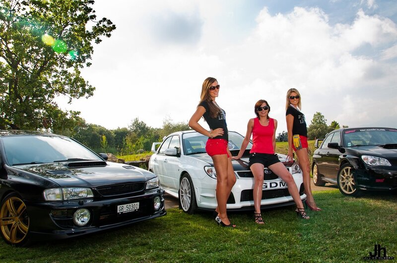 Three Women with Cars