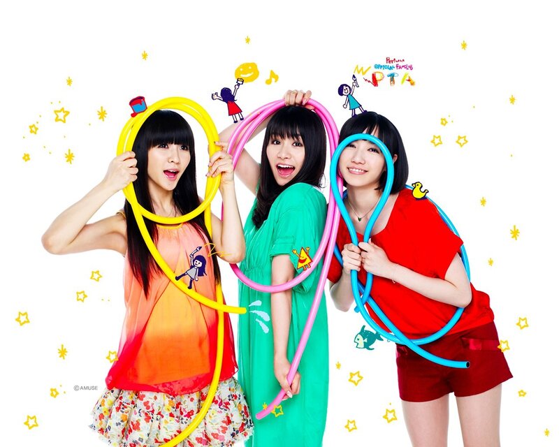 Three women with colorful hula hoops