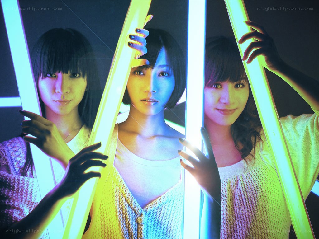 three women with neon lights
