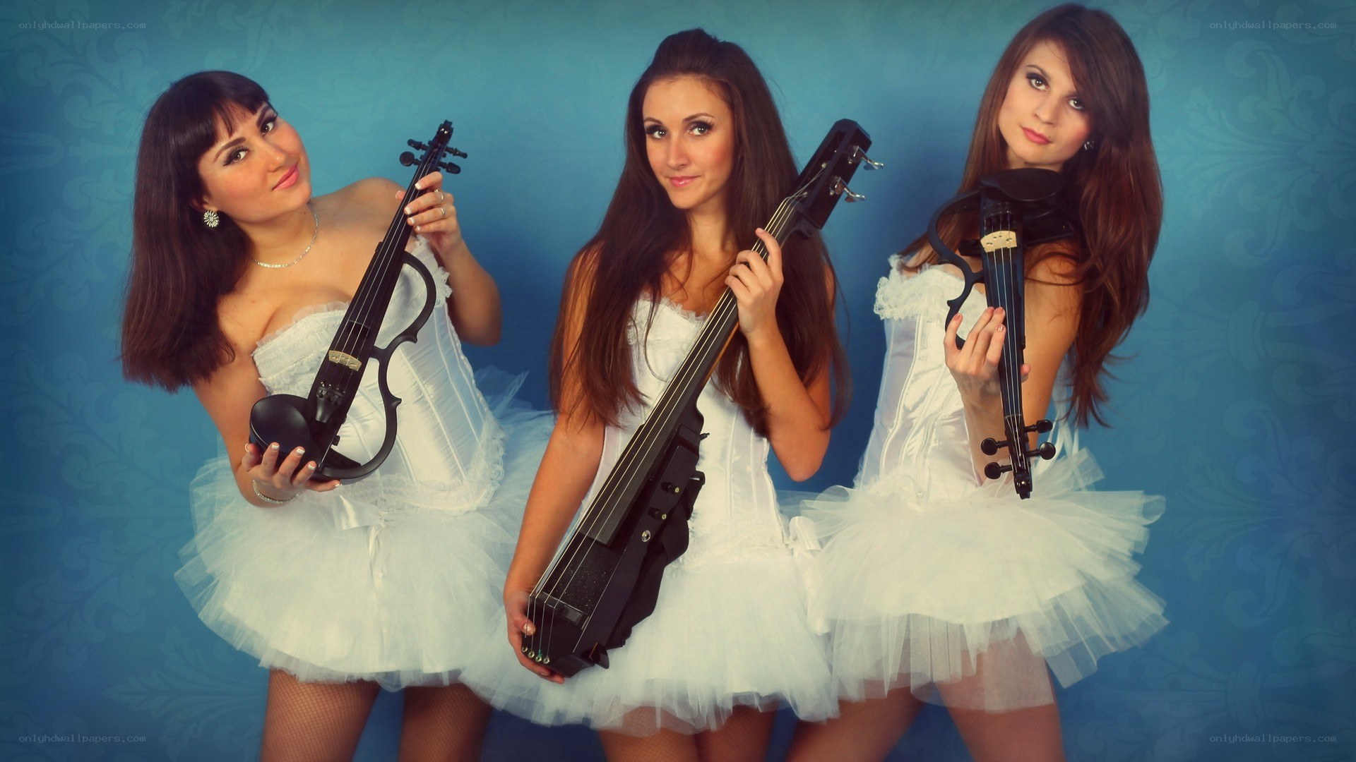 three women with violins