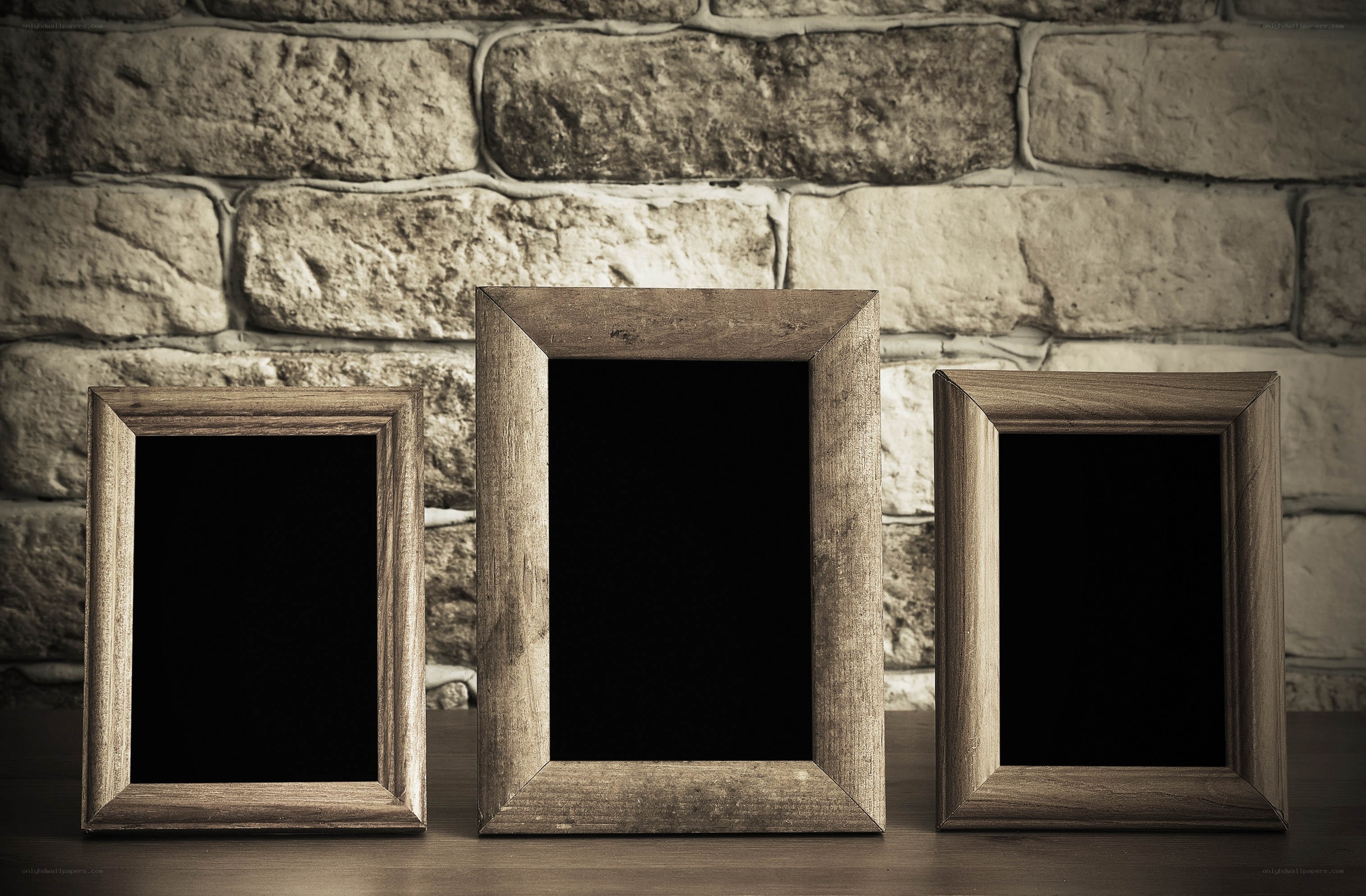 Three wooden photo frames